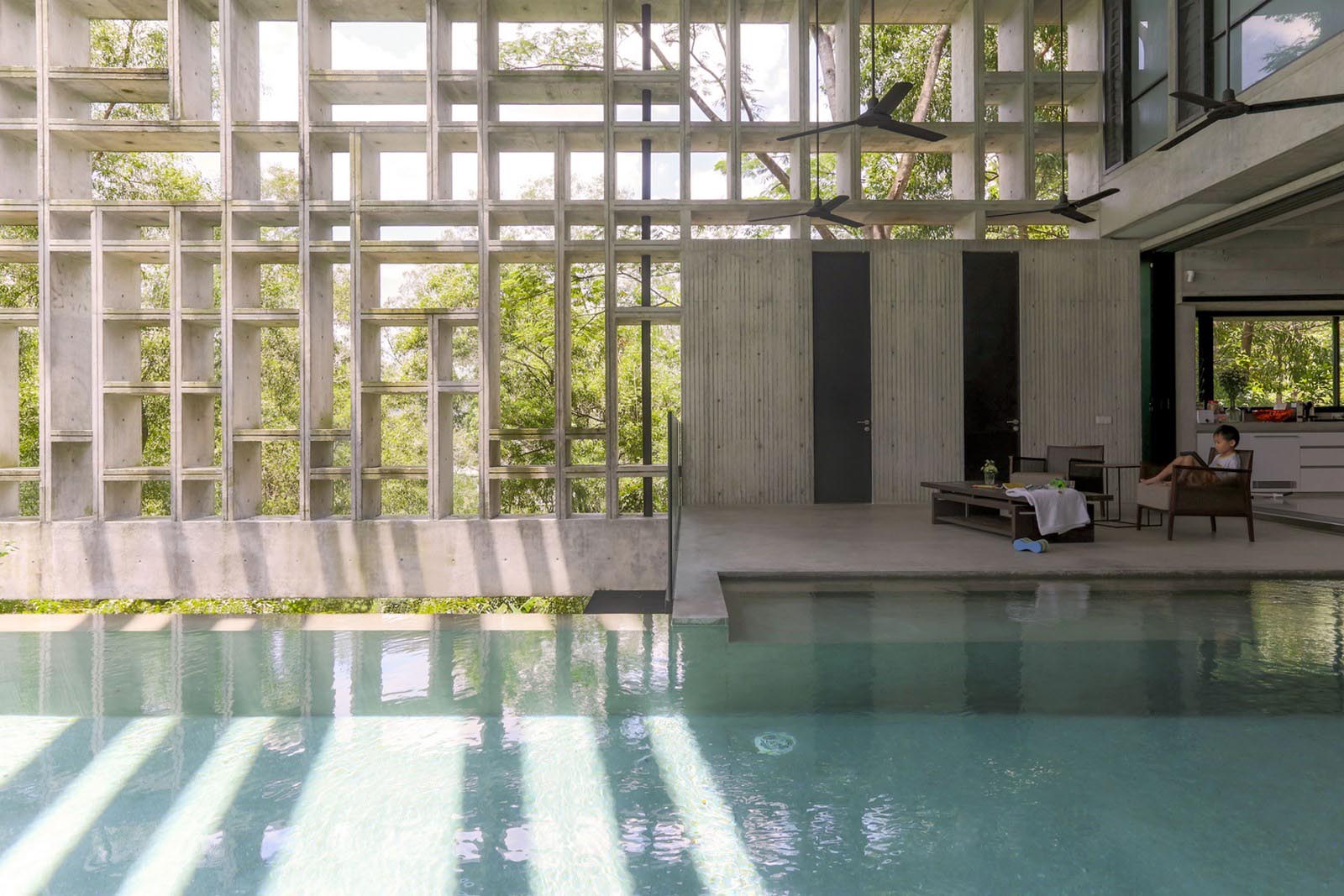 WHBC Architects designed a concrete tropical box that embraces the lush ...